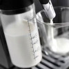 Machine à Café DELONGHI avec broyeur Titane Noir